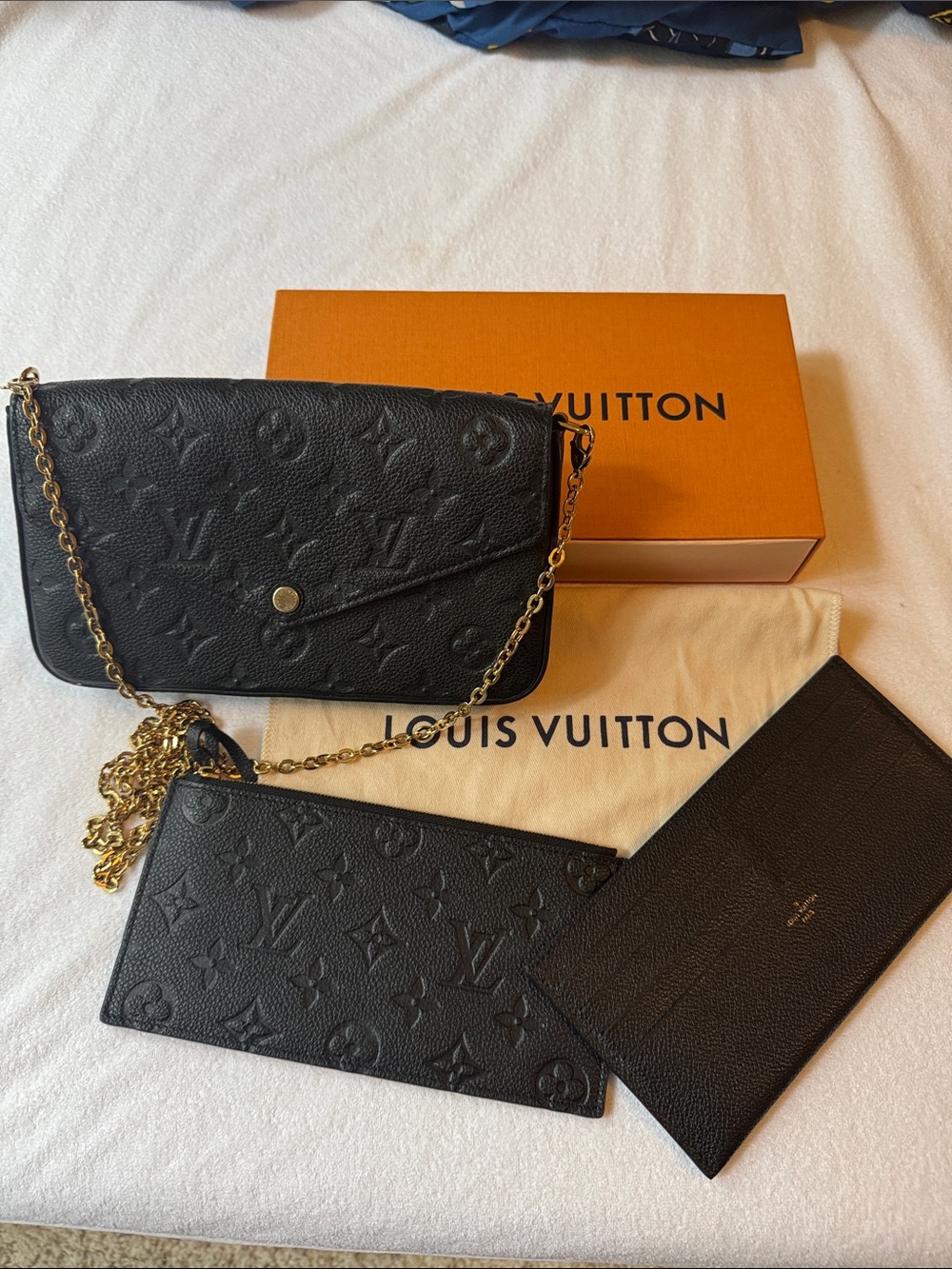 Louis Vuitton Félicie Pochette in black Monogram Empreinte leather